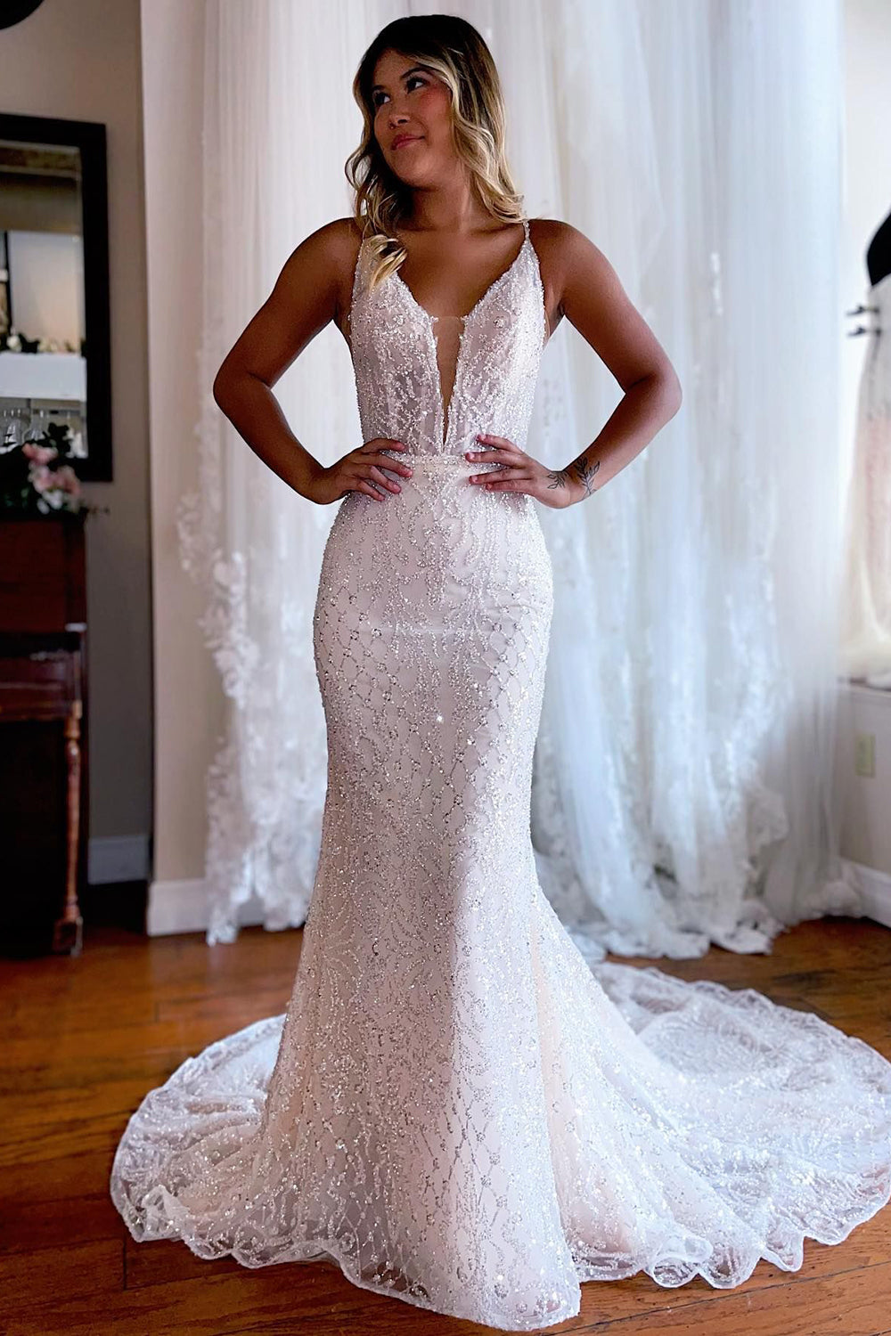 White sparkly shop wedding dress