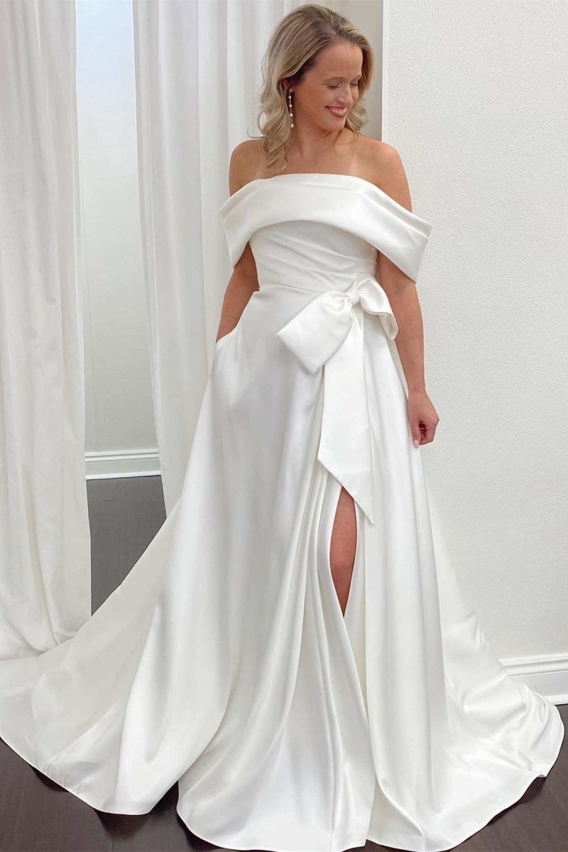 Kinley | White Satin Off - the - Shoulder Bow A - Line Wedding Dress with Slit - KissProm