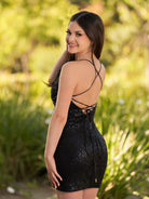 KissProm Sequin Lace Up Short Tight Homecoming Dress | The spaghetti-strap V-neckline delicately frames your collarbone and neck, adding a touch of sultriness to this elegant ensemble.