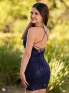 KissProm Sequin Lace Up Short Tight Homecoming Dress | The spaghetti-strap V-neckline delicately frames your collarbone and neck, adding a touch of sultriness to this elegant ensemble.