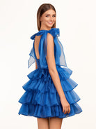 KissProm Trendy  A-Line Royal Blue Tiered Homecoming Dress with Bow | Crafted from durable polyester, the V-neckline frames your face beautifully. Shine bright on your special night in this comfortable and luxurious dress.